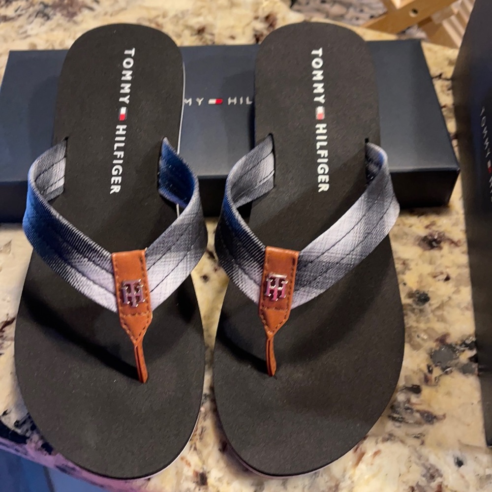 Thong flip flops brand new in box.